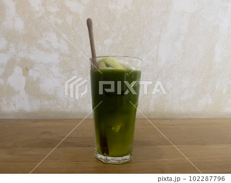 Green tea with coconut juice in coffee shop cafe Green tea with coconut juice in coffee shop cafe 102287796