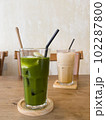 Green tea with coconut juice in coffee shop cafe 102287800