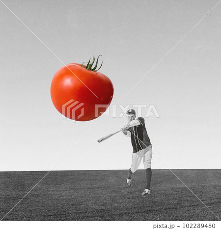 Young man, professional baseball player in uniform playing tomato instead of ball over black and white background. Contemporary art collage 102289480