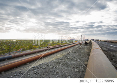 Uncovered pipeline. atural gas construction, crude oil transmission. Uncovered pipeline. atural gas construction, crude oil transmission. 102290095