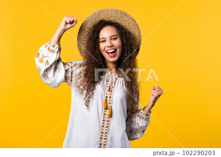 Ukrainian woman shows triumph yes gesture of victory, achieved result, goals. Ukrainian woman shows triumph yes gesture of victory, achieved result, goals. 102290203