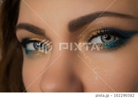 Ukrainian woman close-up, eyes crying, tears running down face.Pain,war, Ukraine 102290382