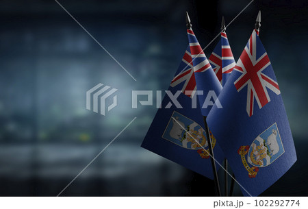 A small Falkland Islands flag on an abstract blurry background 102292774