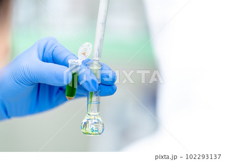 test tubes with chemical solution in the development research laboratory. copy space 102293137