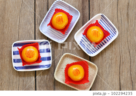 Chinese pastry on the dish. 102294235