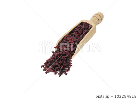 Dried beetroot slices in wooden scoop isolated on white background. in wooden scoop isolated on white background. food ingredient. Dried beetroot slices in wooden scoop isolated on white background. in wooden scoop isolated on white background. food ingredient. 102294818