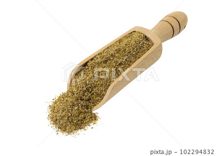 dried common chamomile flowers in latin - Matricaria chamomilla in wooden scoop isolated on white background. Medicinal herb. dried common chamomile flowers in latin - Matricaria chamomilla in wooden scoop isolated on white background. Medicinal herb. 102294832