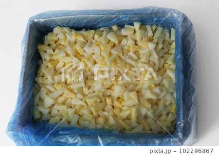 frosted pieces of pineapple closeup photo on white background frosted pieces of pineapple closeup photo on white background 102296867