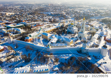 View from the drone of the Trinity-Sergius Lavra and residential quarters of the city of Sergiev Posad. View from the drone of the Trinity-Sergius Lavra and residential quarters of the city of Sergiev Posad. 102299076
