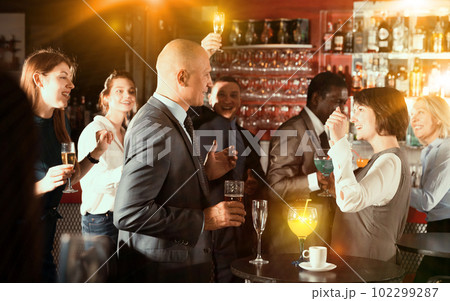 Businessman dancing with female colleague 102299287