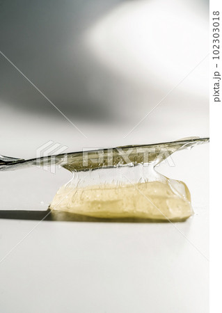 Transparent cosmetic gel on the white background. 102303018