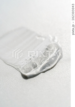 Transparent cosmetic gel on the white background. 102303043