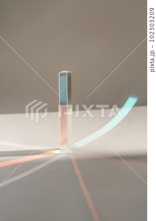 Transparent crystal prism on a white background. 102303209