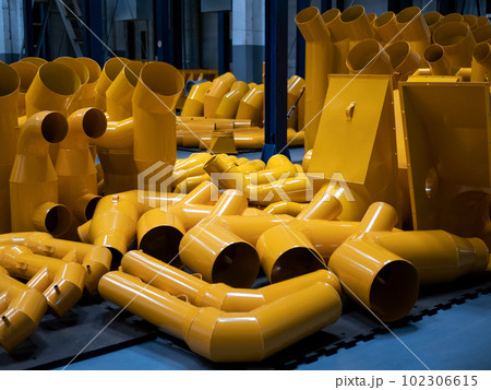 Recently manufactured metal pipes or tubes of different shapes and sizes in workshop or in stock. Metal products Recently manufactured metal pipes or tubes of different shapes and sizes in workshop or in stock. Metal products 102306615
