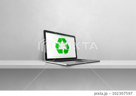 Laptop computer on a shelf with a recycling symbol on screen. environmental conservation concept 102307597