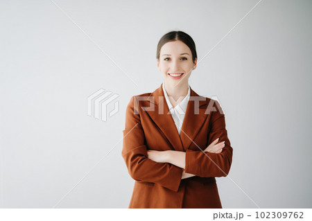 Smiling caucasian young businesswoman bank employee worker manager boss ceo looking at camera, using tablet, laptop and notepad online isolated in white background. Smiling caucasian young businesswoman bank employee worker manager boss ceo looking at camera, using tablet, laptop and notepad online isolated in white background. 102309762