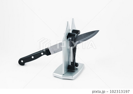knife in a desktop knife sharpener 102313197