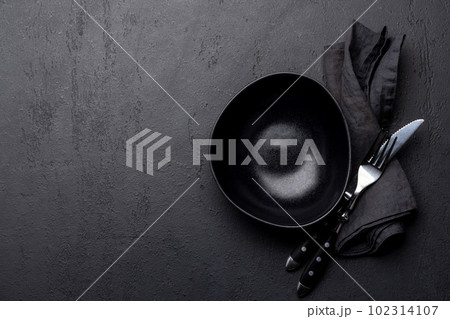 Empty plate with fork and knife Empty plate with fork and knife 102314107