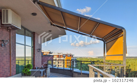 Awning on the terrace. Penthouse on the top floor with a terrace and a gorgeous view of the forest. 102317246