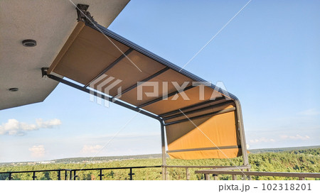 Awning on the terrace. Penthouse on the top floor with a terrace and a gorgeous view of the forest. 102318201
