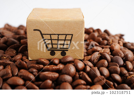 Shopping cart box on coffee beans, shopping online for export or import. Shopping cart box on coffee beans, shopping online for export or import. 102318751
