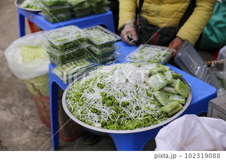 Closeup of Vietnamese green rice or chewy green rice in Vietnamese cuisine 102319088