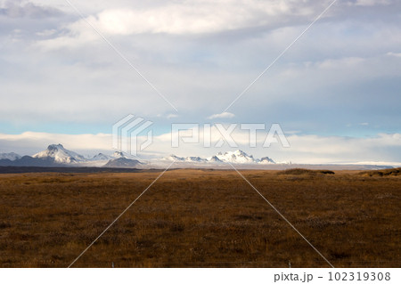 Autumn country and moutains with snow, Iceland 102319308