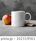 Coffee mug, a white cup on a table with an apple. Styled photo, product mockup 102319561
