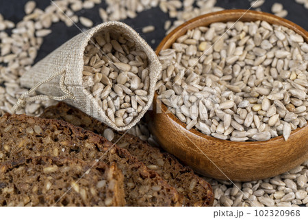 Sunflower seeds peeled from the black shell Sunflower seeds peeled from the black shell 102320968