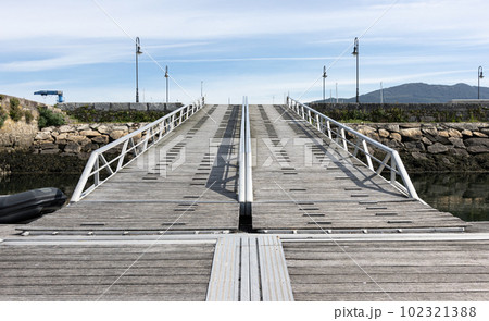 Aluminum and wood Dock ramp. Boat jetty 102321388