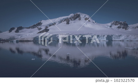 Lemaire strait coast, mountains and icebergs, Antartica 102322570