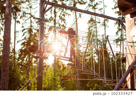 Active children's recreation. Climbing the rope park Active children's recreation. Climbing the rope park 102333427