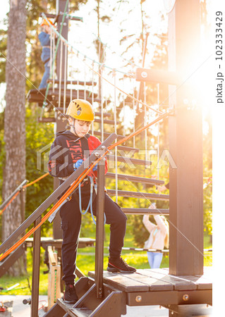Active children's recreation. Climbing the rope park Active children's recreation. Climbing the rope park 102333429