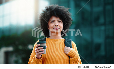 Traveller relaxing with beverage with blurred traffic in background. Close up of a person holding a cup of coffee. Casual tourist with manicured hands and nails getting coffee while exploring. Traveller relaxing with beverage with blurred traffic in background. Close up of a person holding a cup of coffee. Casual tourist with manicured hands and nails getting coffee while exploring. 102334332