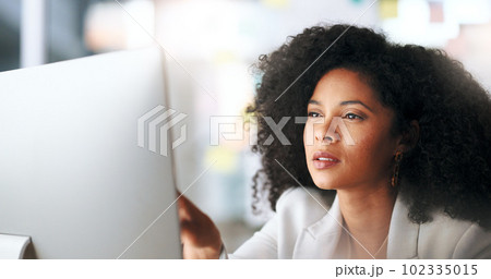 Female IT Manager working on a desktop computer. Happy Information Technology operation professional or expert doing software management for work efficiency in tech organization or business company 102335015