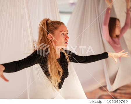 workshop of air yoga and stretching in yoga studio 102340769