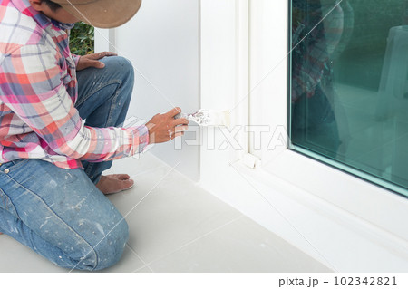 Worker with painting work. Worker with painting work. 102342821
