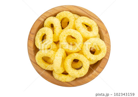 Crispy corn snack in a plate, top view. Traditional snack for beer. Isolated on white background. 102343159