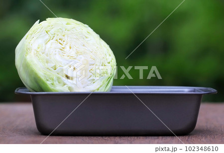 Cabbage on a metal container 102348610