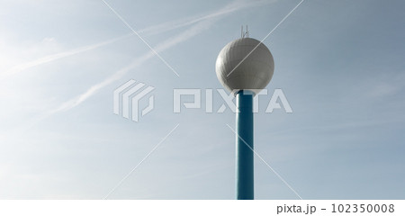 Water tower - drinking water supply container with sky on background, Czech Republic, Europe 102350008