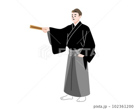 扇子で指し示す袴姿の男性 102361200