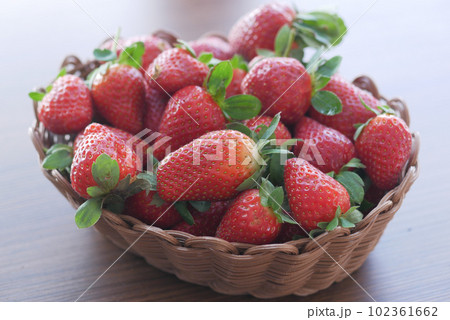 Ripe Red Strawberries in a bowl on table  102361662