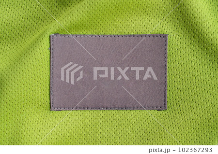 laundry care clothing label patch on polyester fabric jersey sport texture laundry care clothing label patch on polyester fabric jersey sport texture 102367293