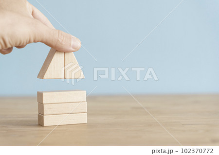 House business concept. House model on an empty background. Rent, construction, real estate idea 102370772