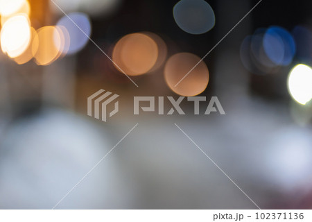 blurred bright background with multicolored bokeh with lights 102371136