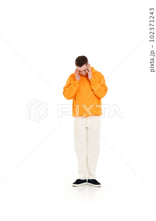 thoughtful man holding arms near head on white background thoughtful man holding arms near head on white background 102371243
