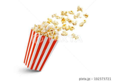 Popcorn flying out of red white striped paper box, isolated on white background 102373721