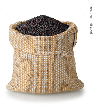 dry rapeseed seeds in burlap sack isolated on white 102376819