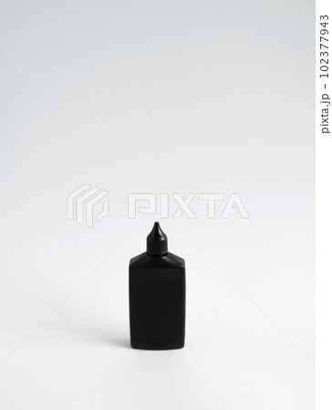 Mock up unbranded black bottle of finish line dry bicycle lubricant. Bicycle care, bicycle chain care. Mock up unbranded black bottle of finish line dry bicycle lubricant. Bicycle care, bicycle chain care. 102377943