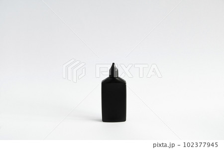 Mock up unbranded black bottle of finish line dry bicycle lubricant. Bicycle care, bicycle chain care. Mock up unbranded black bottle of finish line dry bicycle lubricant. Bicycle care, bicycle chain care. 102377945